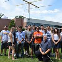 <p>Members of the Bergen Community College STEM Student Union working on summer projects. Professor Joe Sivo is in front. The campus observatory is in the background.</p>