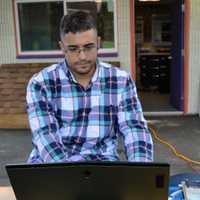 <p>Jesse Kent at his outdoor work station.</p>
