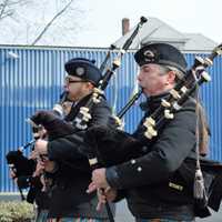 <p>Bagpipers marching up Washington Avenue.</p>