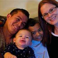 <p>Brittany and Rolando Gregorio with sons Adam (L) and Jayden, who inspired mom to start Glow Jars by Britt.</p>