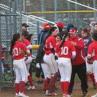 <p>North Rockland gets a pep talk from coach Jackie DiNuzzo before the bottom of the seventh.</p>