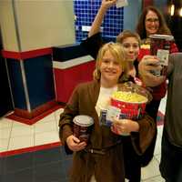 <p>A family heads to the Stamford theater, with both boys wearing &#x27;Star Wars&#x27; style jackets.</p>