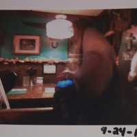 <p>Many believe this photo - taken in 2011 by CT Spirit Investigators, of Hamden, Conn. - shows a ghost of a woman on a veil (right side) at a table at Smalley&#x27;s Inn.</p>