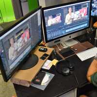 <p>Greg Riccardi editing a video at Video Marketing Group in Allendale.</p>