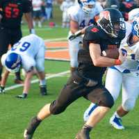 <p>Mamaroneck&#x27;s Kieffer Barchetti carries the ball vs. Mahopac.</p>