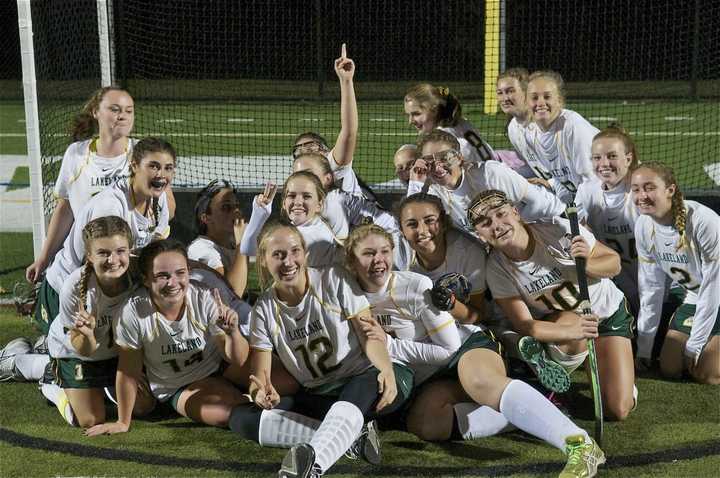 The Hornets celebrate in the goal after beating Rye in the Class B title game.