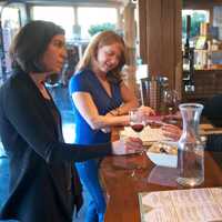 <p>Wine lovers enjoy a taste at Jones Family Farms Winery in Shelton.</p>