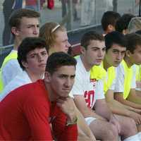 <p>Somers players watch the action from the sideline Wednesday at Lakeland High School.</p>