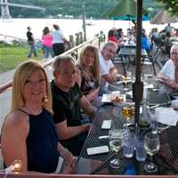 <p>Diners enjoy a fine meal as they wait for the fireworks show at the Ice House.</p>