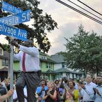 <p>Crowd cheering after Teaneck Township Manager William Broughton unveils the new street sign at the corner of Selvage Avenue and Stasia Street.</p>