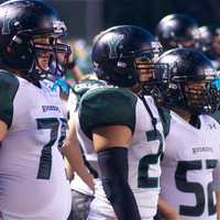 <p>The Yorktown sideline watches the action.</p>