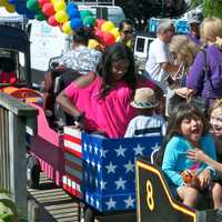 <p>Kids and adults took rides on a mini train that traveled around the Sales Days area.,</p>