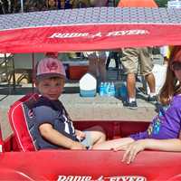 <p>These kids got a ride, and stayed cool at the same time at Sales Days.</p>