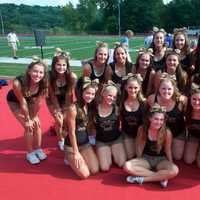 <p>Carmel&#x27;s cheerleaders get together for a photograph at Saturday&#x27;s game. </p>