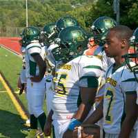 <p>Ramapo players on the sideline watch the action Saturday at Carmel.</p>