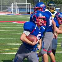 <p>Carmel&#x27;s Eric Melchione runs for a TD in the Rams&#x27; win over Ramapo.</p>