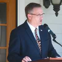 <p>Dutchess County Legislature Chairman Dale Borchert reads the Declaration of Independence Monday morning in Fishkill.</p>