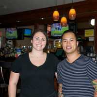 <p>Handshakes&#x27; Brooke Formica with Faul Su, whose family owns and runs Handshakes Bar &amp; Grill.</p>