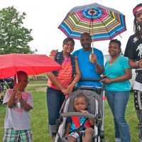 <p>A mostly happy family - the little one is sad he wont get to see the balloon launch.</p>