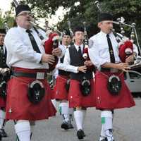 <p>Bagpipers from Clan Na Vale start the ceremony by escorting first responders to the 9/11 Memorial.</p>