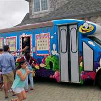 <p>Party-goers line up at the Sweet Central Express truck for ice cream at a recent birthday party.</p>