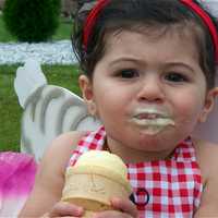 <p>The birthday girl enjoys an ice cream cone from Sweet Central Express.</p>