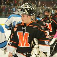 <p>Mamaroneck and Suffern players shake hands after the game.</p>