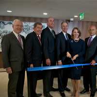 <p>City officials and dignitaries including Mayor Tom Roach (2nd from R), Susan Fox (with scissors), Kevin Plunkett (3rd from L), Steven Safyer (3rd from R) and Larry Smith (4th from L) at Monday&#x27;s ribbon cutting ceremony at White Plains Hospital.</p>