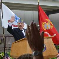 <p>Dr. Carl Singer asking for a show of hands for POWs in attendance at POW/MIA Recognition Day in Hackensack.</p>