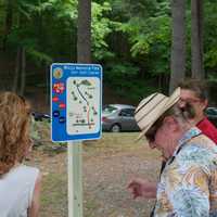 <p>Visitors check out a map of the new course.</p>