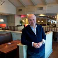 <p>Owner Frank Georgiou poses for a photo at the diner.</p>