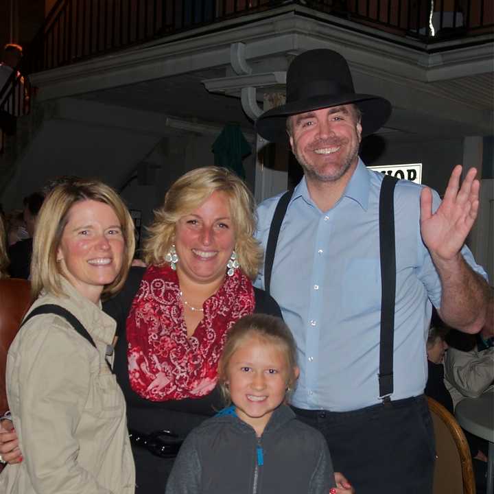 More than 600 people rocked the night away at Putnam County Golf Course Friday night for Oktoberfest. Here, Brother Big Daddy Abel, of the Amish Outlaws, poses for a photo with guests.