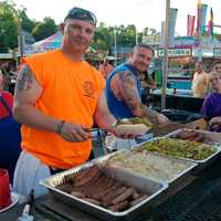 <p>The men serving up all that great food at the Mahopac Volunteer Fire Department carnival.</p>