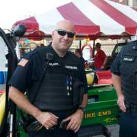 <p>Members of the Carmel PD were on hand at the carnival,</p>