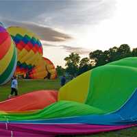 <p>Balloons are inflated for a sunrise mass launch the 2013 HV Balloon Festival.</p>