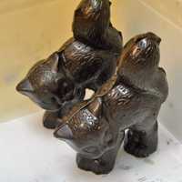 <p>Dark chocolate Halloween cats in the making at Hanna Krause's Homemade Candy.</p>