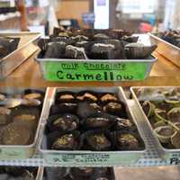 <p>Amid the vast assortment of chocolates at Hanna Krause's Homemade Candy in Paramus are some new innovations, including the Carmellow, a mix of carmel and marshmallow.</p>