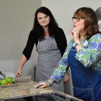 <p>Marta Kazirod of Garfield, left, assists Chef Carrie Weiss.</p>