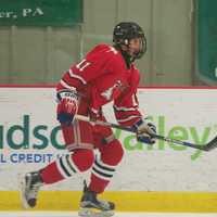 <p>Fox Lane&#x27;s Trevor Zegras (11) had three goals early for Fox Lane.</p>