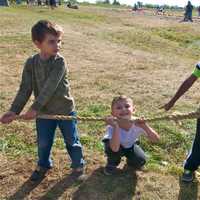 <p>Playing tug-of-war.</p>