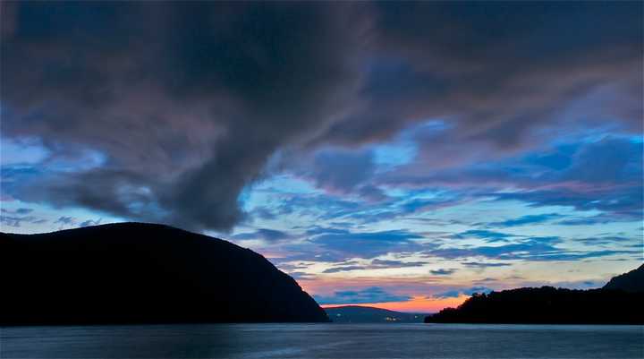 Area thunderstorms resulted in these painted skies and blowing storm clouds over the Hudson.