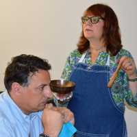 <p>Chef Carrie Weiss rings out "Zen and the Art of Clean Eating" as Paul Povolo of Totowa experiences the sound.</p>
