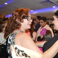 <p>Sideras&#x27; mother greets family and friends.</p>