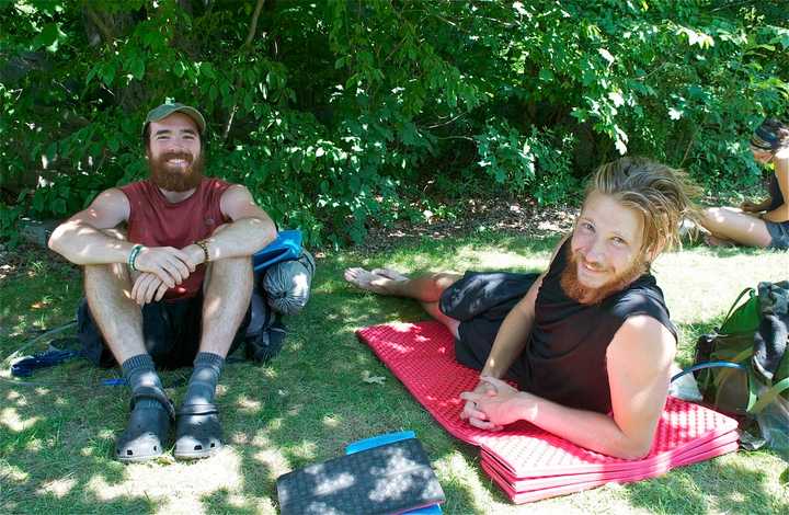 Nicknamed Songbird (L) and Foot (R) for the duration of their Adirondack Trail journey, the hikers take a break for food, drink and rest at Mountaintop Market.