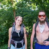 <p>Hikers head back to the trail after eating and resting at Mountaintop Market.</p>