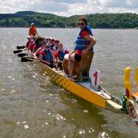 <p>The Marist Fire Foxes team heads for the dock after finishing a race.</p>