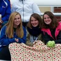 <p>Fans stay warm at Saturday&#x27;s soccer game at Carmel.</p>