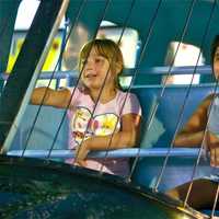 <p>Two kids enjoy a helicopter ride at the Dutchess County Fair.</p>