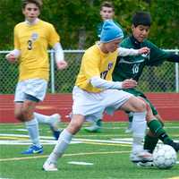 <p>Carmel&#x27;s Vladamire Palcki (L) battles Brewster&#x27;s Martin Saljanin, who had two goals in the Brewster win.</p>