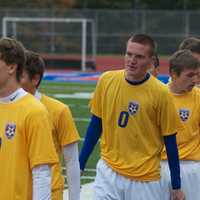 <p>The Carmel boys soccer team shakes hands with Brewster&#x27;s team.</p>